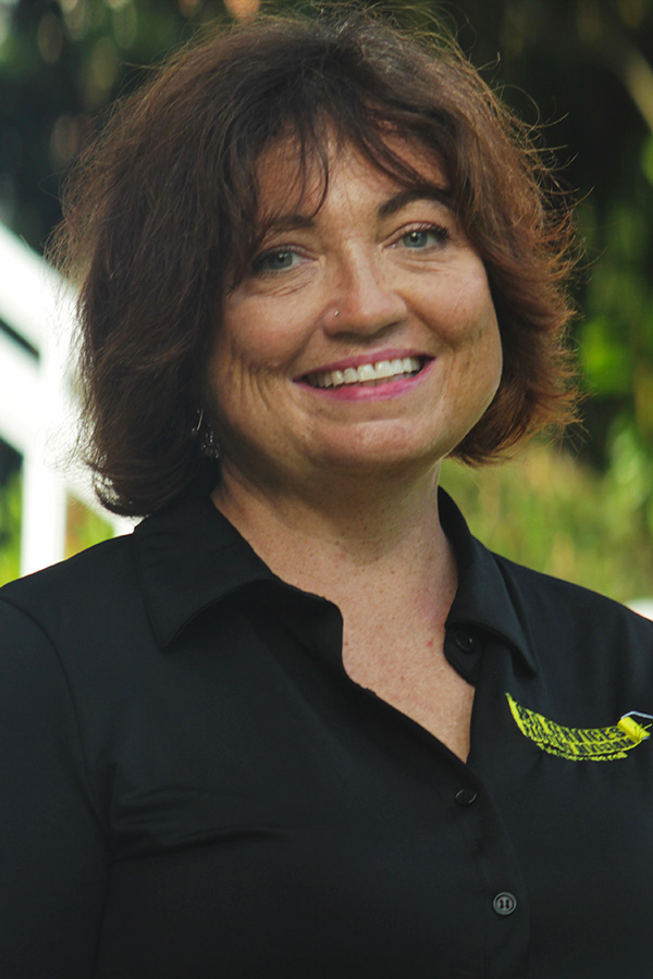 Billie from JBG Painting wearing branded company shirt, representing professional painting services team