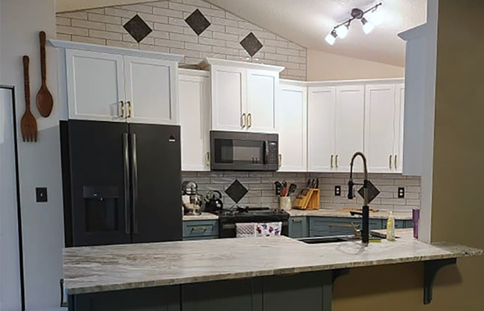 Gray painted entryway with crown molding and decor accents by JBG Painting Wilmington NC.